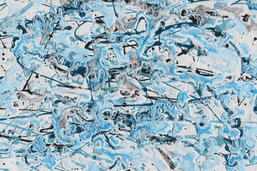 Colorful wet abstract paint leaks and splashes texture on white watercolor paper background. Natural organic shapes and design.