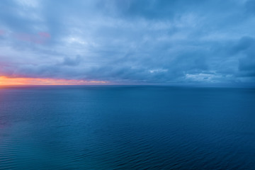Fototapeta premium Aerial view of ocean at dusk