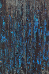 Colorful wet abstract paint leaks and splashes texture on white watercolor paper background. Natural organic shapes and design.