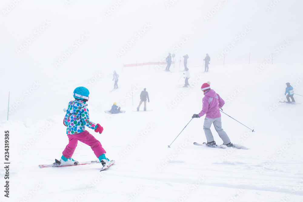 Wall mural family at the ski resort