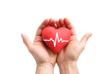 Red heart with pulse in man's hands.
