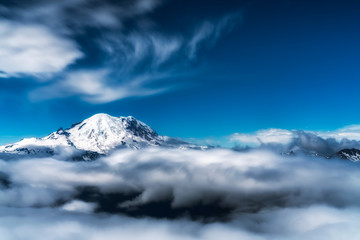 Obraz premium whimsical mountain peak in the clouds