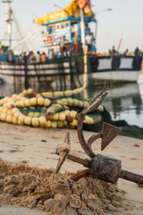 Fishermen getting ready to go fishing at Betul Beach in Goa 
