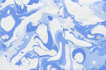 Fototapeta na wymiar Colorful marble ink paper texture on white background. Chaotic abstract organic design. Bath bomb waves.