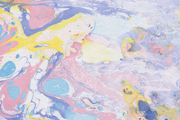 Fototapeta premium Colorful marble ink paper texture on white background. Chaotic abstract organic design. Bath bomb waves.