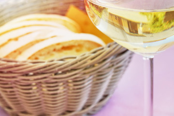 White wine and basket of bread