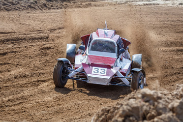 Kart races on a cross-country terrain