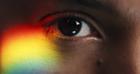 close up woman eye beautiful rainbow light reflecting multicolored eyesight macro lgbt concept