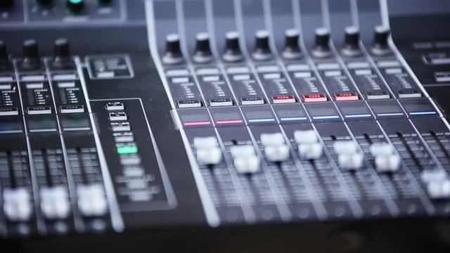Digital sound recording.  Professional sound mixer. Close-up view of sound mixer control. Modern technology. Media sound mixer button line.