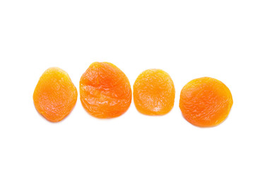 Dried apricots isolated on white background. Side view