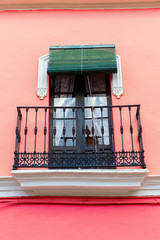 window at a typical Andalusian house in Seville, Spain