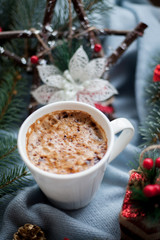 Christmas cappuccino with festive decorations