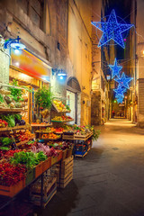 Fototapeta premium Illuminated Christmas street in Florence