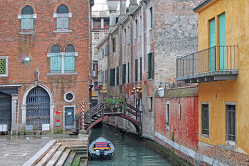 Fototapeta na wymiar Closeup of canals and bridge of Venice. Venice, Italy