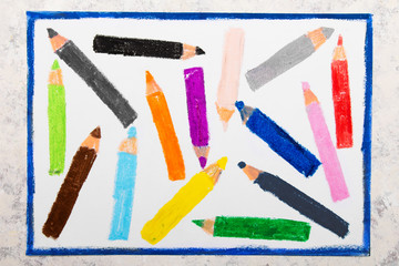 Colorful hand drawing: colorful crayons on white paper