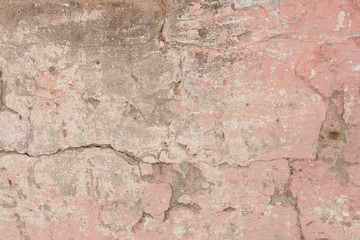 Obraz premium Wall fragment with scratches and cracks. It can be used as a background
