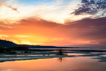 Obraz premium colorful sky at sunset on the sea beach.