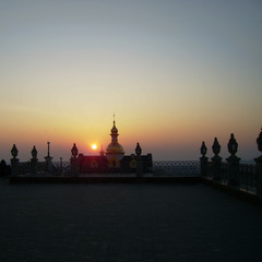 Fototapeta premium Sunset and dome of the church.