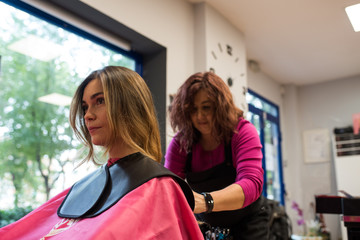 Woman donating hair for cancer
