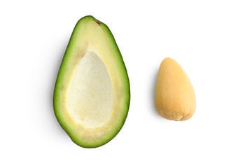 Avocado cut in half on a white background. Avocado with bone close up on white background.