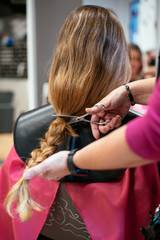 Obraz na płótnie Canvas Woman donating hair for cancer