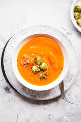 Pumpkin soup with brussels sprouts plant based food overhead