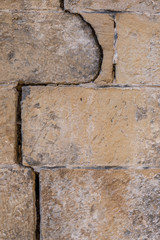 Schäden an Sandsteinwand