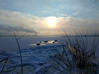 Sunrise on frosen Dnipro river, Ukraine