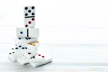 Dominoes on white wooden table