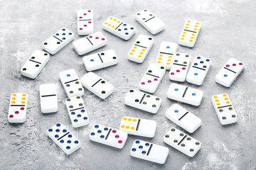 Dominoes on grey wooden table