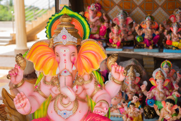 Fototapeta na wymiar Idols of Hindu lord Ganesh/Ganesha being sold in Goa, India on the occasion of Ganesh Chaturthi Festival 