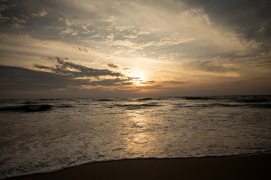 Sunset at seashore. Waves is coming. © mishamif