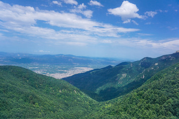 Aerial view of the green mountains of Uludag while climbing