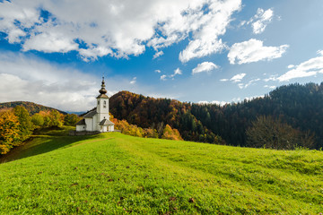 Fototapeta na wymiar Sv. Marko chapel in Lower Danje, Slovenia at autumn colors