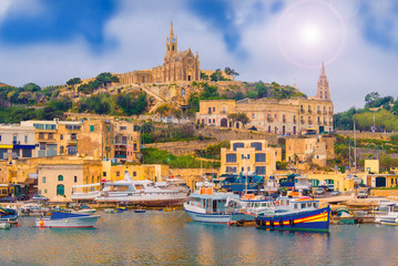 Historical city of Gozo island, Our Lady of Lourdes Chapel in Għajnsielem overlooking Mġarr Harbour in Malta - obrazy, fototapety, plakaty