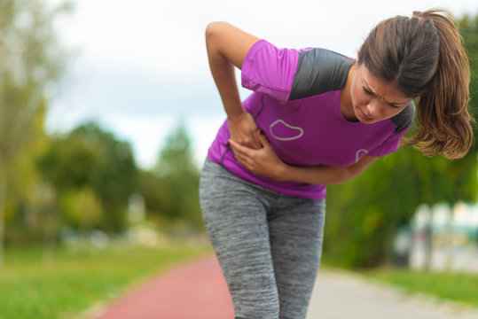 Side Stitch - Woman Runner Side Cramps After Running