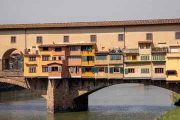 Fototapeta na wymiar Old bridge Ponte Vecchio at Arno river in Florance