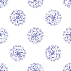 Floral seamless pattern. Mandala flower decorative elements. Ethnic abstract ornament. Oriental style background. Blue flowers on white background monochrome. Minimal flower pattern.