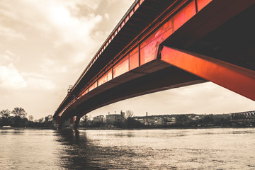 Red bridge above river