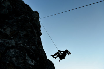 dynamic move of the crazy rock climber