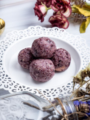 Healthy organic date energy balls with berry, dried fruits and nuts. Food for healthy lifestyle.