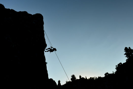 dynamic move of the crazy rock climber