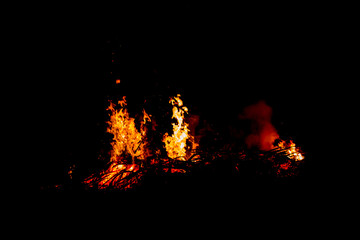 Forest fire silhouette Black background light