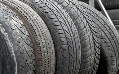 A few used wheel tires with different protector.