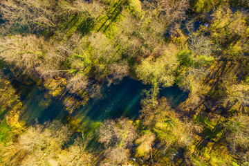     Mreznica river in Croatia from air, drone shoot, top down view, Karlovac county, green nature, wood and waterfalls in autumn 