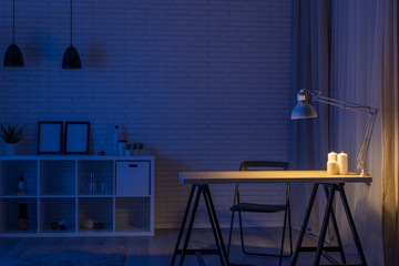 Lamp and work desk at night, overtime concept - 234354596