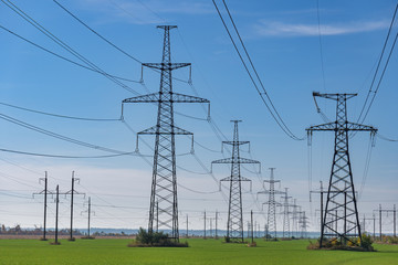 High-voltage power lines. Electricity distribution station. high voltage electric transmission...