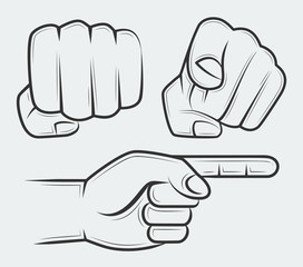 Fototapeta premium Punching fist, hand with index finger pointing at the viewer and side view pointing hand