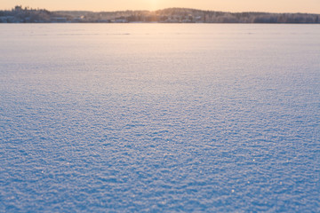 Snow surface at frozen lake