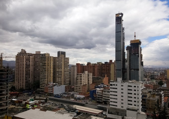 Overview of the central district of Bogota, the capital of Colombia. Concept of modernization of this developing country, construction industry. BD Bacata building and mass transport Transmilenio.